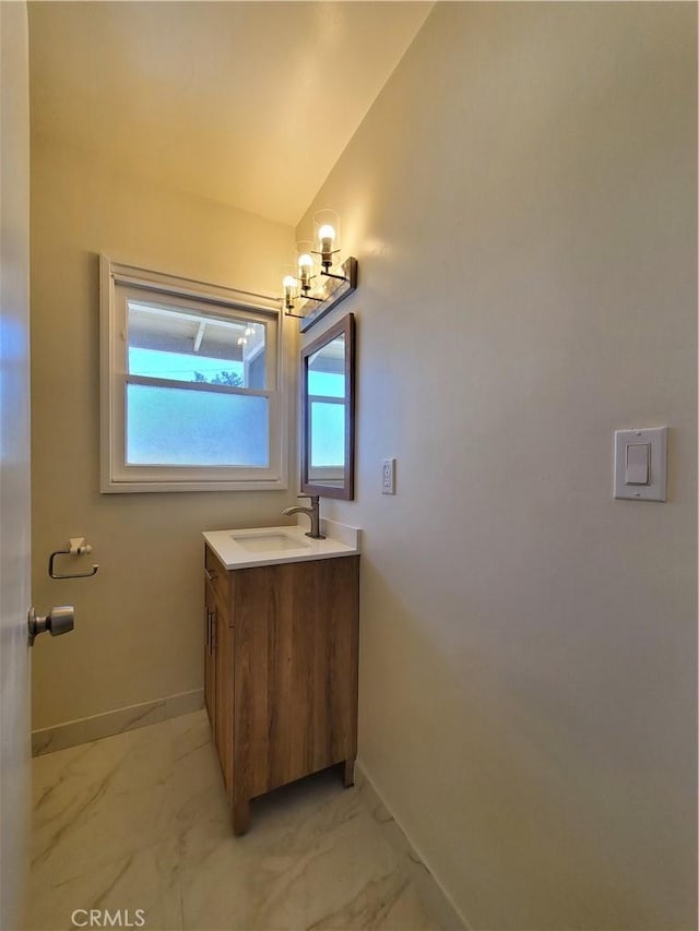 17623 Clymer St, Granada Hills, CA 91344 - bathroom with vanity, marble finish floors, a chandelier, and vaulted ceiling