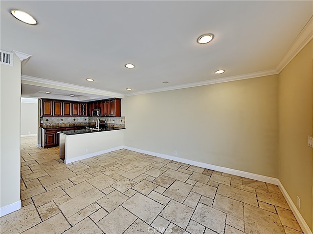 2030 Kingsbridge Way, Oxnard, CA 93035 - kitchen featuring stainless steel microwave, stone tile floors, ornamental molding, a peninsula, and decorative backsplash