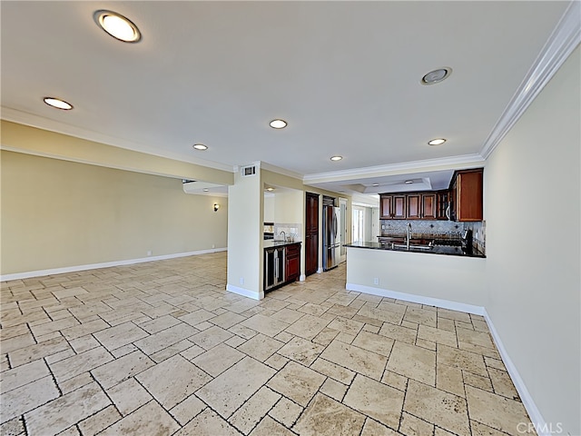 2030 Kingsbridge Way, Oxnard, CA 93035 - kitchen featuring ornamental molding, stainless steel refrigerator, open floor plan, recessed lighting, and backsplash
