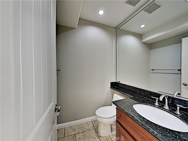 2030 Kingsbridge Way, Oxnard, CA 93035 - half bathroom featuring vanity, recessed lighting, and stone tile flooring