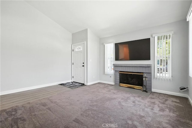 25796 Olivas Park Rd, Valencia, CA 91355 - unfurnished living room with a fireplace, carpet flooring, and vaulted ceiling