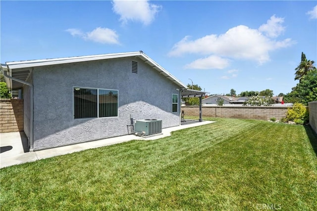 25796 Olivas Park Rd, Valencia, CA 91355 - back of property featuring a fenced backyard, stucco siding, and a patio area