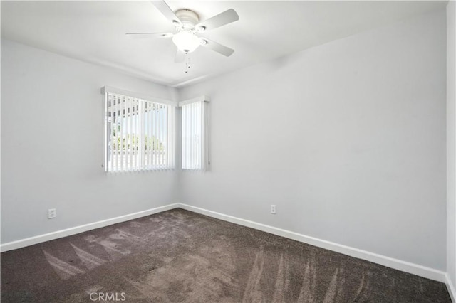 25796 Olivas Park Rd, Valencia, CA 91355 - empty room with dark carpet and ceiling fan