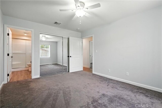 25796 Olivas Park Rd, Valencia, CA 91355 - unfurnished bedroom featuring carpet, a closet, connected bathroom, and a ceiling fan