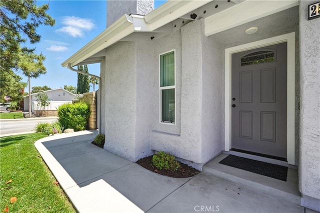 25796 Olivas Park Rd, Valencia, CA 91355 - entrance to property featuring stucco siding