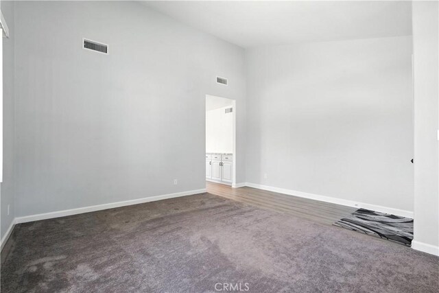 25796 Olivas Park Rd, Valencia, CA 91355 - unfurnished room with carpet floors and high vaulted ceiling