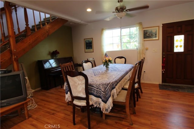 20512 Berendo Ave, Torrance, CA 90502 - dining room with wood finished floors, ceiling fan, recessed lighting, and stairs