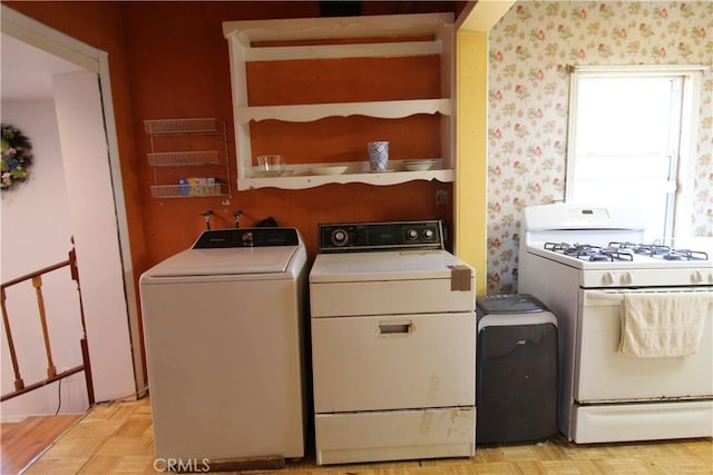 20512 Berendo Ave, Torrance, CA 90502 - laundry area with wallpapered walls and washing machine and clothes dryer