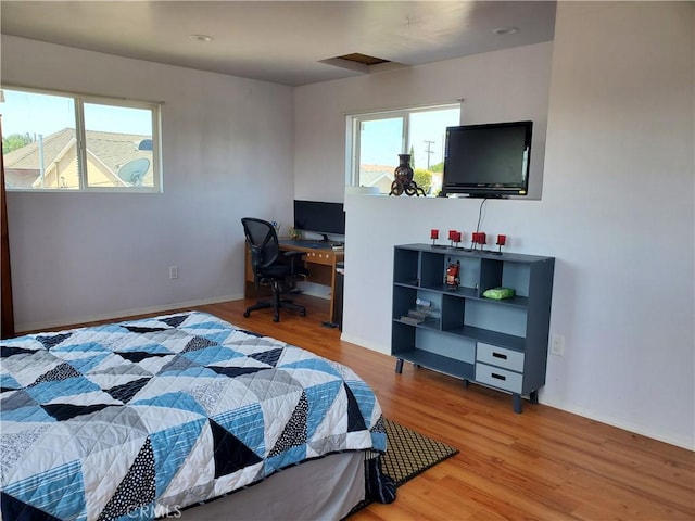 20512 Berendo Ave, Torrance, CA 90502 - bedroom with wood finished floors and an office area
