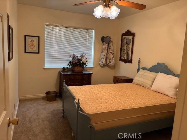 32079 Fern Dr, Running Springs, CA 92382 - carpeted bedroom with baseboards and ceiling fan