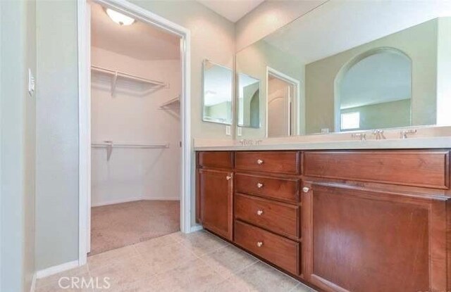 1063 S Reservoir St, Pomona, CA 91766 - full bath featuring double vanity and a spacious closet