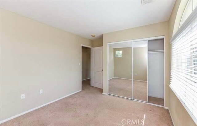 1063 S Reservoir St, Pomona, CA 91766 - unfurnished bedroom with carpet and a closet