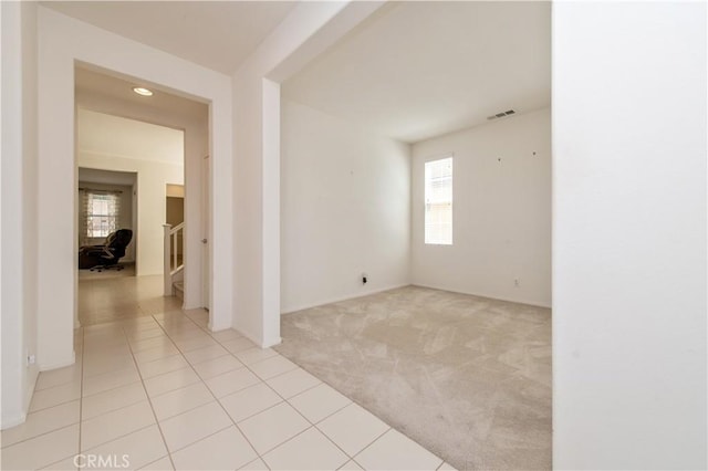10324 Bold Red Dr, Rancho Cucamonga, CA 91730 - spare room with plenty of natural light, light colored carpet, light tile patterned floors, and recessed lighting
