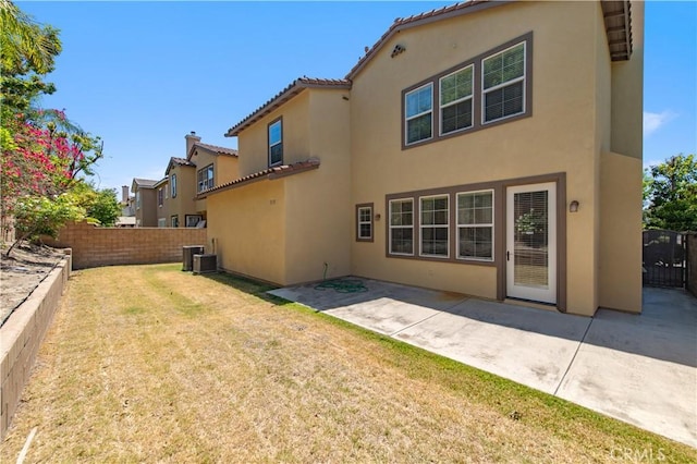 10324 Bold Red Dr, Rancho Cucamonga, CA 91730 - back of house with stucco siding, a fenced backyard, a patio, and a tile roof
