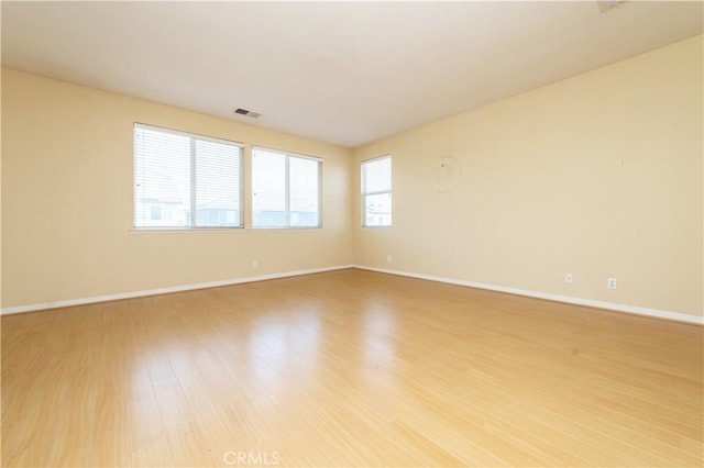 10324 Bold Red Dr, Rancho Cucamonga, CA 91730 - unfurnished room with light wood-style floors and baseboards