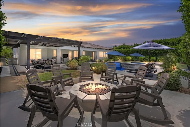 48692 Pear St, Indio, CA 92201 - view of patio / terrace featuring a fire pit and a pool with connected hot tub