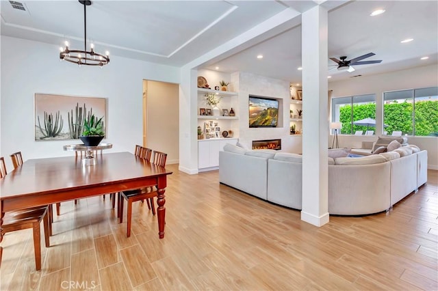 48692 Pear St, Indio, CA 92201 - dining area with recessed lighting, light wood-type flooring, a chandelier, built in shelves, and ceiling fan