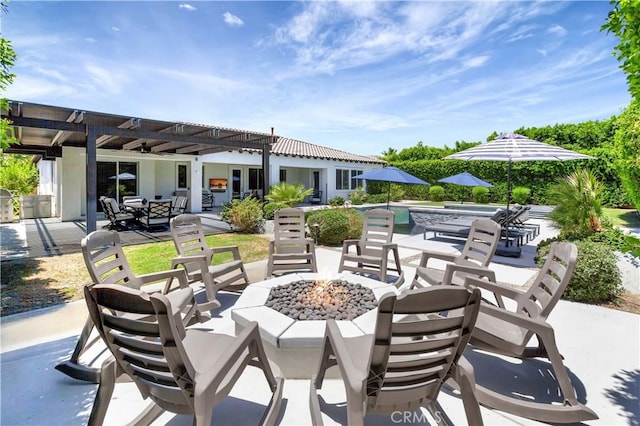 48692 Pear St, Indio, CA 92201 - view of patio with a fire pit