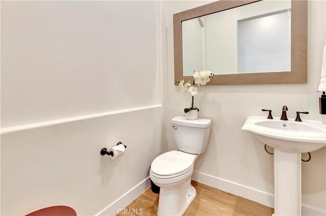 48692 Pear St, Indio, CA 92201 - bathroom with toilet and wood finished floors