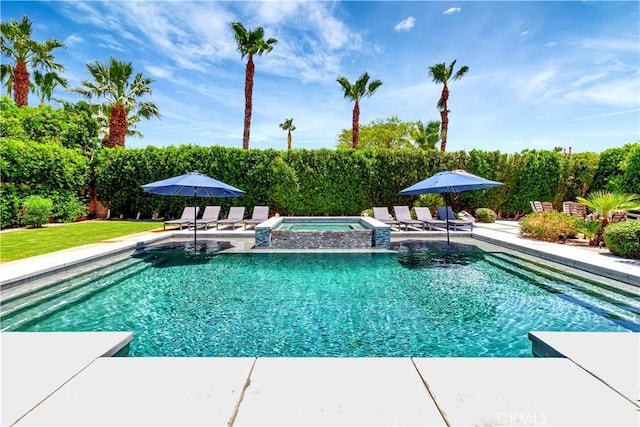 48692 Pear St, Indio, CA 92201 - view of swimming pool featuring a pool with connected hot tub and a patio