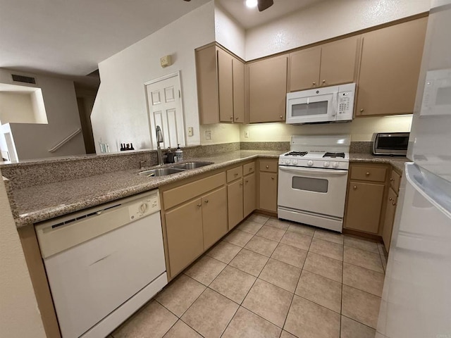 1111 Magellan Way, Chula Vista, CA 91910 - kitchen featuring white appliances, light tile patterned flooring, and a peninsula