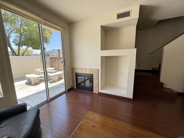 1111 Magellan Way, Chula Vista, CA 91910 - living area featuring hardwood / wood-style floors, stairway, and a fireplace