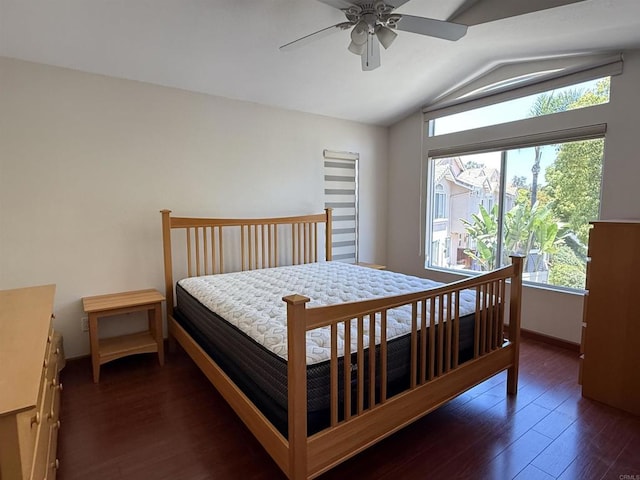 1111 Magellan Way, Chula Vista, CA 91910 - bedroom with vaulted ceiling, multiple windows, dark wood-style flooring, and a ceiling fan