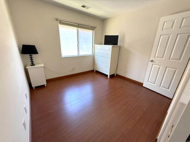 1111 Magellan Way, Chula Vista, CA 91910 - unfurnished bedroom with dark wood finished floors and baseboards