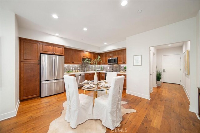 627 Deep Valley Dr Unit 410, Rolling Hills Estates, CA 90274 - dining space with light wood-type flooring and recessed lighting