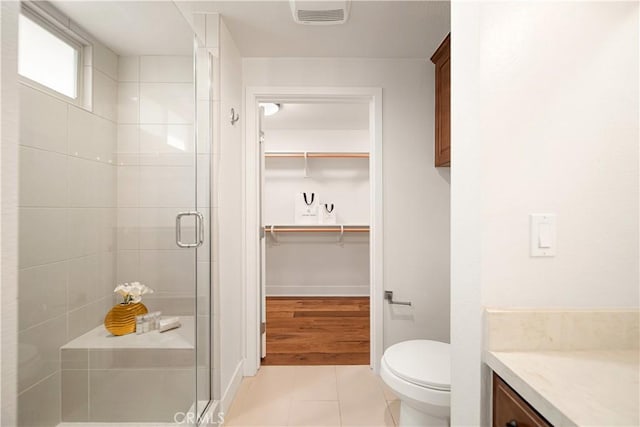 627 Deep Valley Dr Unit 410, Rolling Hills Estates, CA 90274 - full bath with a shower stall, a walk in closet, vanity, and tile patterned floors