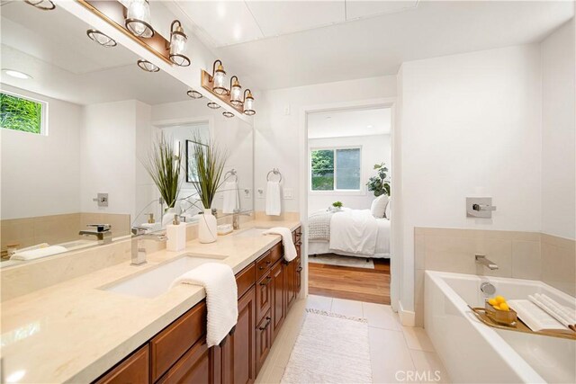 627 Deep Valley Dr Unit 410, Rolling Hills Estates, CA 90274 - bathroom with double vanity, a bath, plenty of natural light, and tile patterned floors