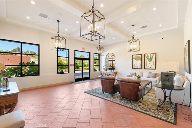627 Deep Valley Dr Unit 410, Rolling Hills Estates, CA 90274 - living area with healthy amount of natural light, a chandelier, recessed lighting, coffered ceiling, and a raised ceiling