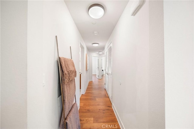 627 Deep Valley Dr Unit 410, Rolling Hills Estates, CA 90274 - hallway with light wood-style flooring and baseboards