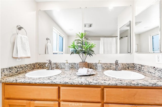 18202 Foss Ln, Huntington Beach, CA 92648 - full bathroom featuring double vanity and a shower with shower curtain