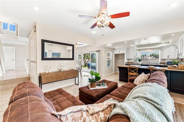 18202 Foss Ln, Huntington Beach, CA 92648 - living area with light tile patterned floors, ceiling fan, and recessed lighting
