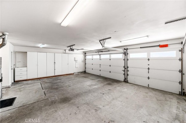 18202 Foss Ln, Huntington Beach, CA 92648 - garage featuring a garage door opener