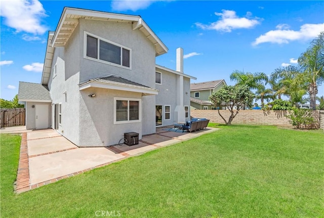 18202 Foss Ln, Huntington Beach, CA 92648 - rear view of property featuring stucco siding, a fenced backyard, and a patio