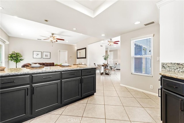 18202 Foss Ln, Huntington Beach, CA 92648 - kitchen featuring a ceiling fan, healthy amount of natural light, light tile patterned floors, recessed lighting, and open floor plan