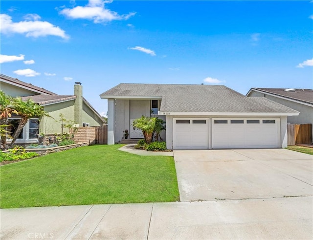 18202 Foss Ln, Huntington Beach, CA 92648 - view of front of home with an attached garage, concrete driveway, stucco siding, and a shingled roof