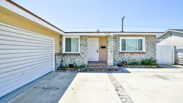 7360 Thunderbird Ln, Stanton, CA 90680 - entrance to property with stone siding