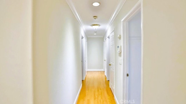 7360 Thunderbird Ln, Stanton, CA 90680 - hallway featuring crown molding and light wood finished floors