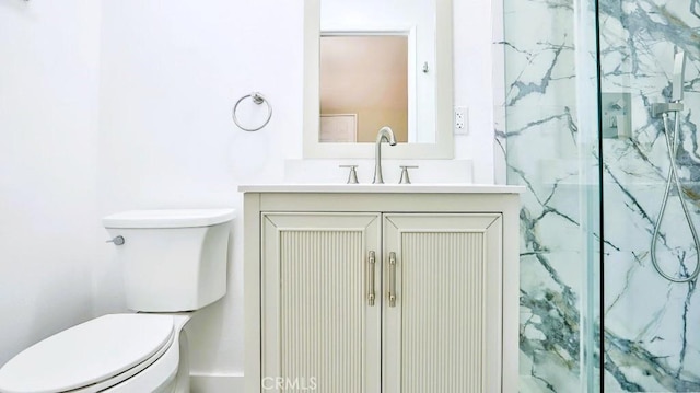 7360 Thunderbird Ln, Stanton, CA 90680 - bathroom featuring vanity and a marble finish shower