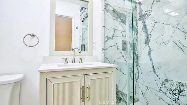 7360 Thunderbird Ln, Stanton, CA 90680 - full bath with vanity and a marble finish shower
