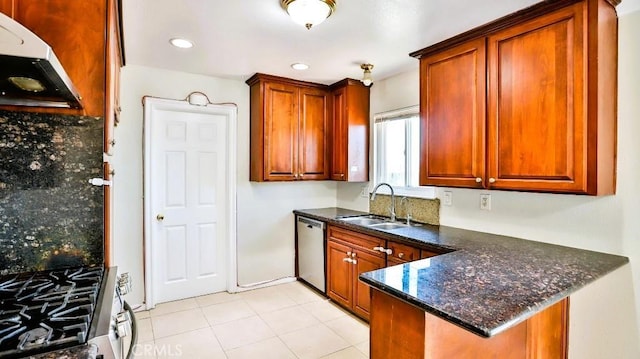 7360 Thunderbird Ln, Stanton, CA 90680 - kitchen with range hood, stainless steel appliances, a peninsula, decorative backsplash, and dark stone counters