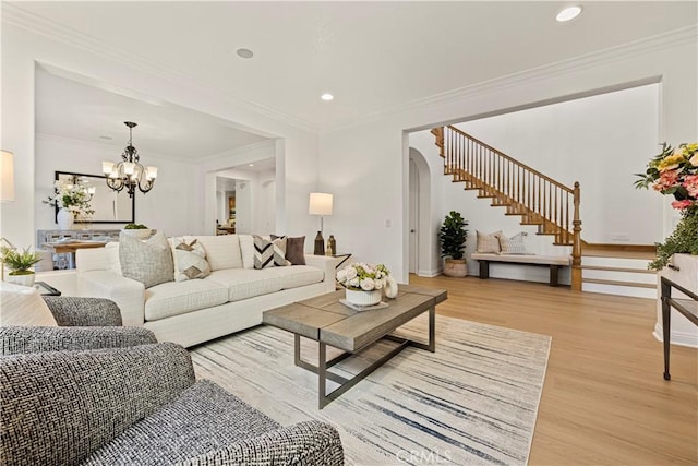 20100 Livorno Ln, Yorba Linda, CA 92886 - living room featuring stairs, a chandelier, light wood-type flooring, recessed lighting, and ornamental molding