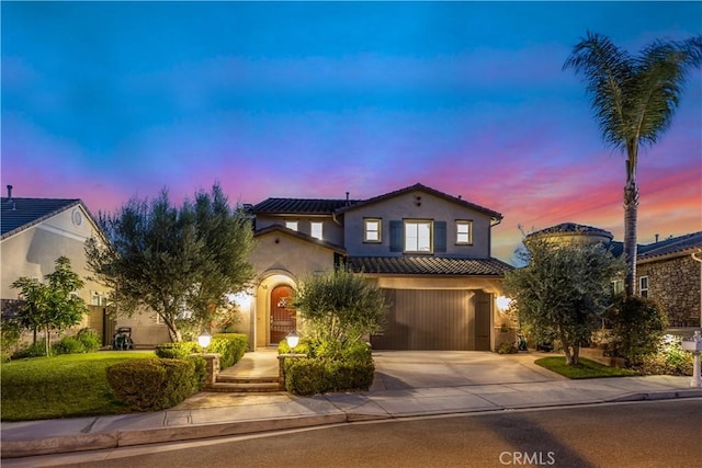 20100 Livorno Ln, Yorba Linda, CA 92886 - mediterranean / spanish home with driveway, a garage, stucco siding, and a tile roof