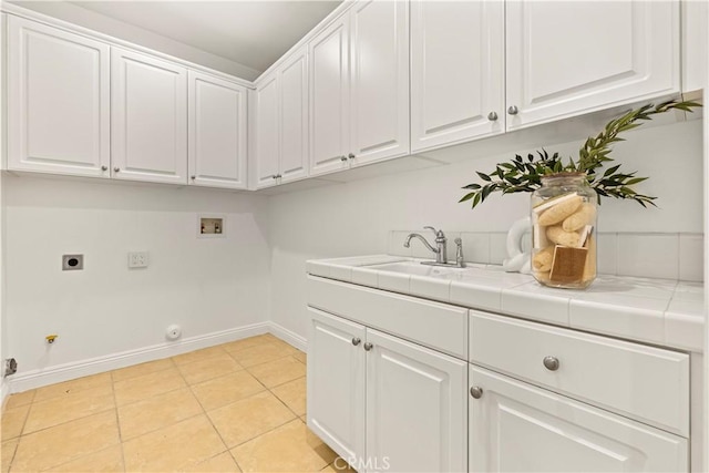20100 Livorno Ln, Yorba Linda, CA 92886 - laundry room with cabinet space, hookup for a washing machine, electric dryer hookup, and light tile patterned floors