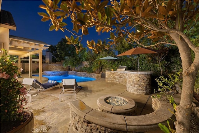 20100 Livorno Ln, Yorba Linda, CA 92886 - patio at night featuring a fire pit, a patio area, and a fenced backyard