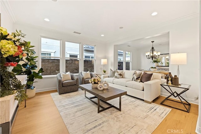 20100 Livorno Ln, Yorba Linda, CA 92886 - living area featuring light wood-style flooring, a chandelier, crown molding, and recessed lighting