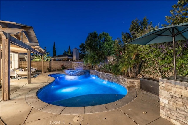 20100 Livorno Ln, Yorba Linda, CA 92886 - pool at night featuring a patio, a fenced backyard, and a pool with connected hot tub